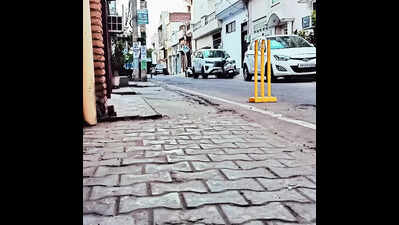 Scramble to comply with green tiles order amid civic backlash