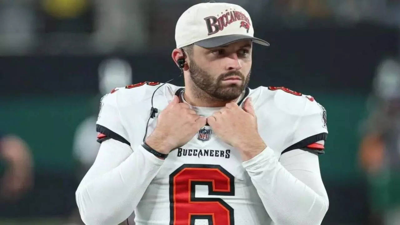 Rent free in their heads for almost a decade Baker Mayfield Reacts to Texas Players Planting Flag and Posing With His Jersey After Win Over Oklahoma NFL News Times of India