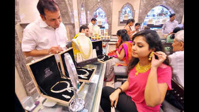 Gold hits fresh all-time highs, dampens festive season demand