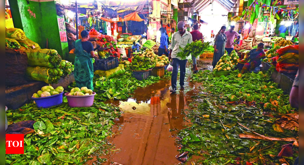 Rain leaves Koyambedu market filthy, prices drop sharply | Chennai News