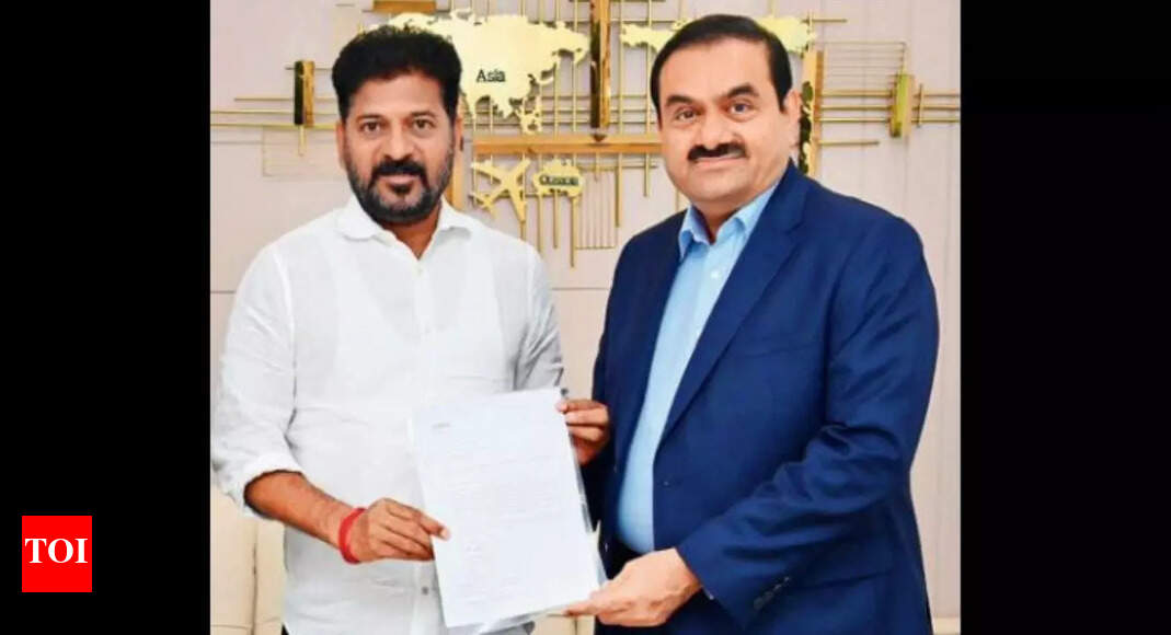 Gautam Adani hands over Rs 100 crore to CM Revanth Reddy for Skills ...