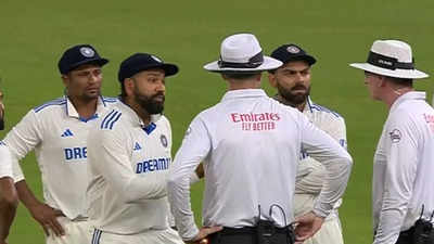 Tensions flare as Rohit Sharma, Virat Kohli engage in heated argument with umpires over bad light decision. Watch