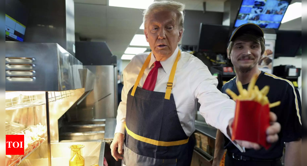 ‘Worked 15 minutes more than Kamala … ‘ Trump visits McDonald’s in Philadelphia; works the frier – Times of India