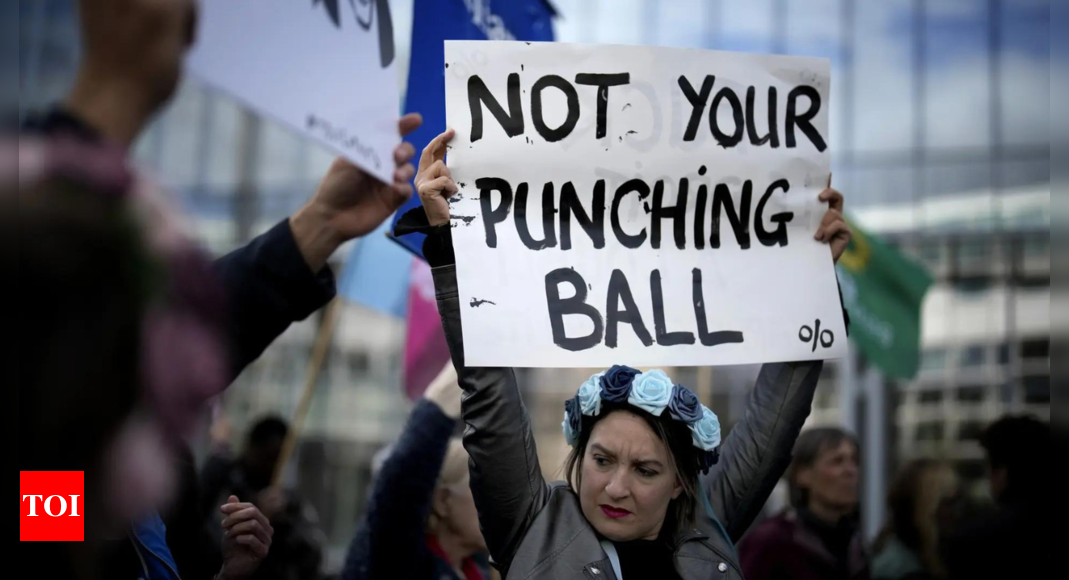 ‘Not your punching ball’: France protest in solidarity with mass rape victim Gisèle Pelicot – Times of India