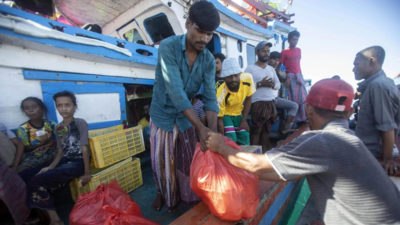 About 140 Rohingya Muslims on wooden boat off Indonesia's coast as residents refuse to let them land