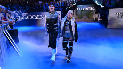 Liv Morgan and Dominik Mysterio featured on WWE production truck ahead of WrestleMania 41