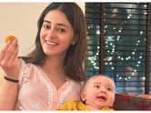 Ananya poses with Alanna's baby River on Diwali