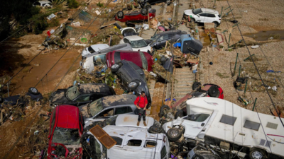 Spain floods: Death toll surges to 150, crew search vehicles and flooded structures for bodies