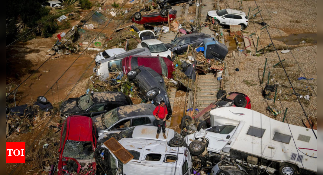 Spain floods: Death toll surges to 150, crew search vehicles and flooded structures for bodies – Times of India