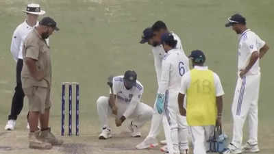 Mukesh Kumar assists groundsman with pitch repairs during IND-A vs AUS-A 'unofficial' Test. WATCH