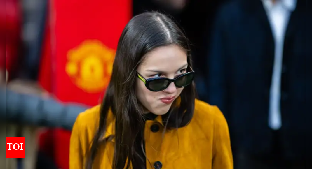 Olivia Rodrigo and Louis Partridge enjoy premier league match at Old