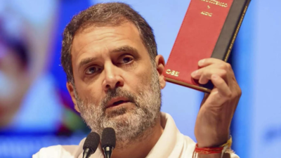 BJP, Congress trade barbs over 'red' Constitution carried by Rahul Gandhi