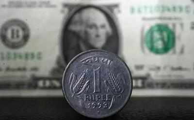 Rupee slips 5 paise to all-time low of 84.37 against US dollar