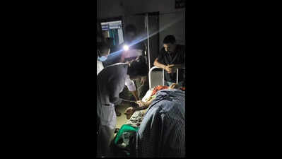 DHH staff treat patient under mobile light