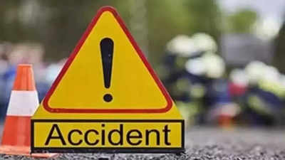 A woman and her co-passenger were injured when their car collided with a divider in Noida. | Noida News - Times of India