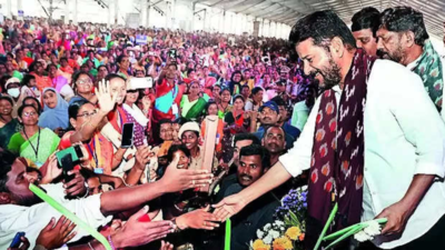 Chief minister A Revanth Reddy greets people at the ‘Praja Vijayotsavalu’ meeting in Warangal on Tuesday Will develop Warangal on par with Hyderabad, says Revanth Reddy