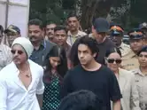 SRK holds Suhana's hand as they arrive to cast vote