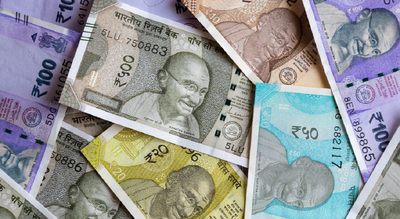 Rupee hits a new low at 84.50 against US dollar