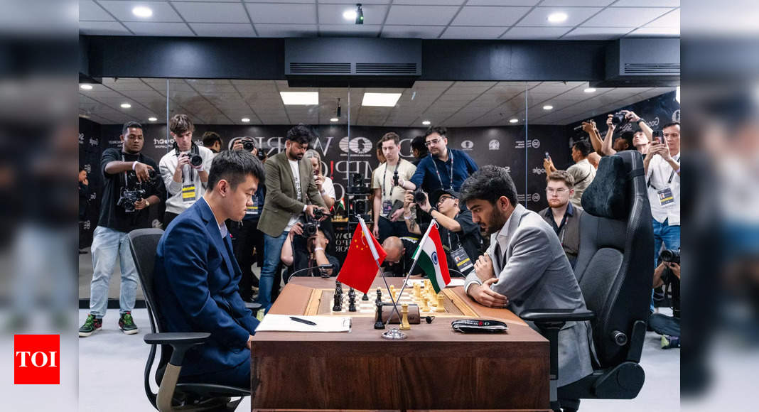 World Chess Championship: Ding Liren draws first blood, beats D Gukesh in Game 1 | Chess News – Times of India