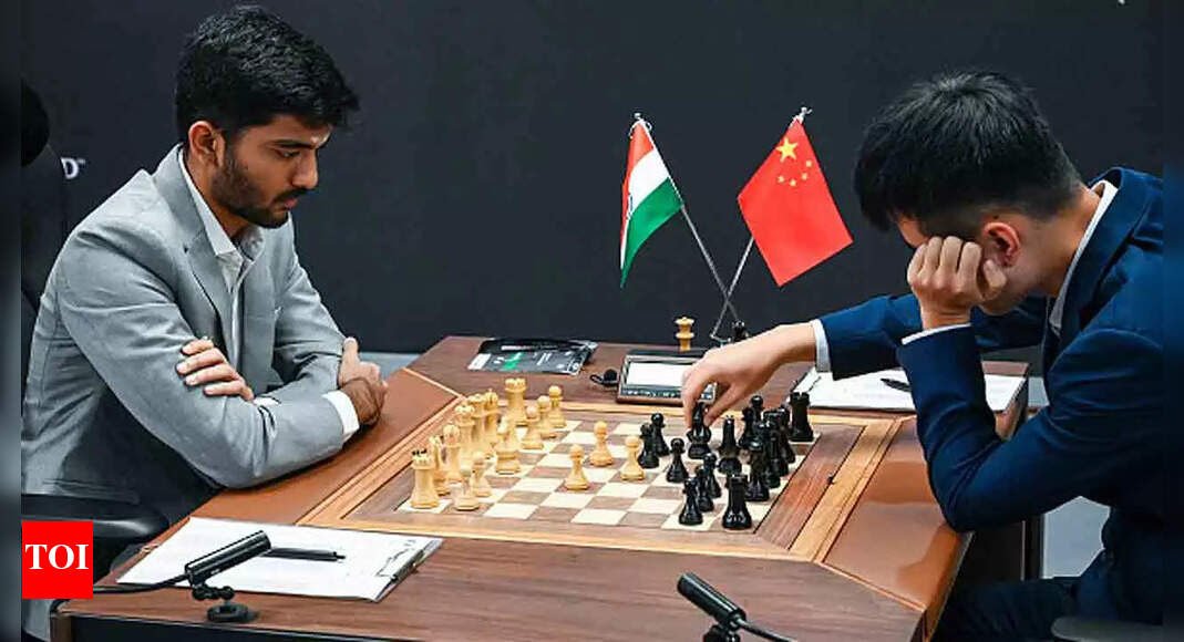 World Chess Championship: D Gukesh back on level terms as Ding Liren loses on time | Chess News