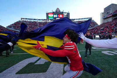 Should NCAA ban flag planting? Here's what Buccaneers QB Baker Mayfield had to say about this tradition