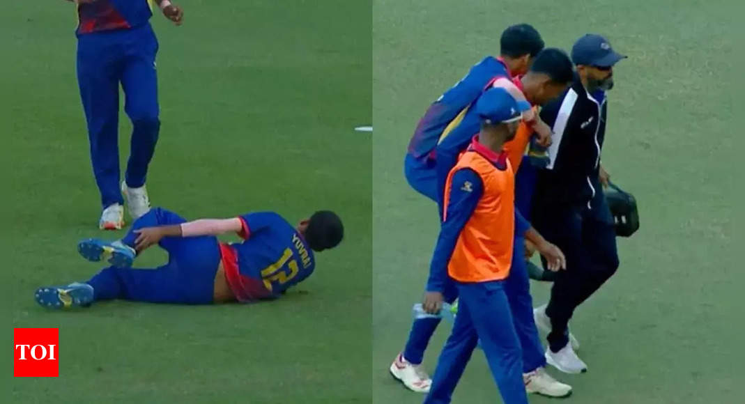 Wicket celebration gone wrong! Bowler horribly twists ankle. Watch