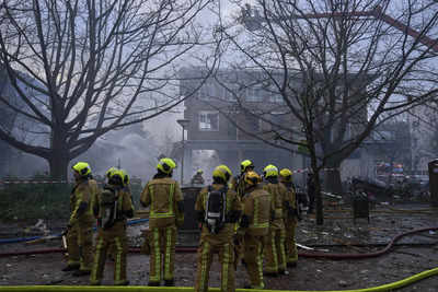 Rescuers search for victims after explosion at Dutch apartment block that killed at least 5