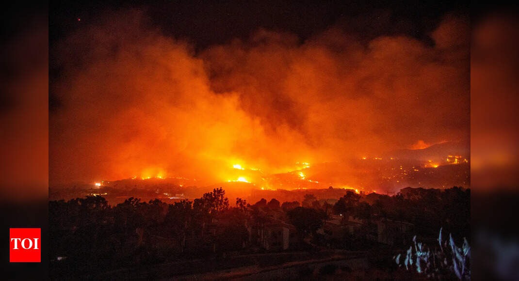 Malibu wildfire is raging out of control as dry winds fan flames