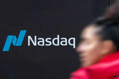 Nasdaq surges above 20,000 for first time