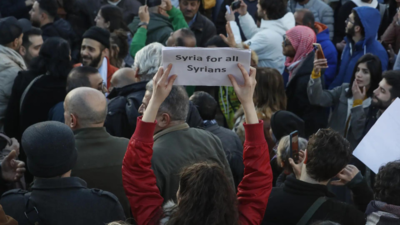 'Want democracy, not religious state': Hundreds rally in Syria for freedom and women's rights