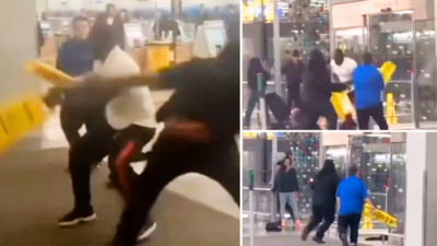  Passengers, employees clash at O'Hare with 'wet floor' signs – watch viral fight