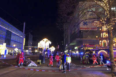 Two killed, 60 injured as car rams into crowd at German Christmas market; Saudi man arrested