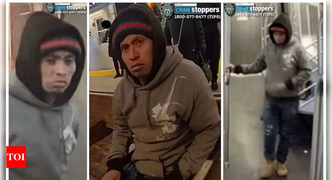 New York police work to identify woman set on fire on subway, question suspect – Times of India