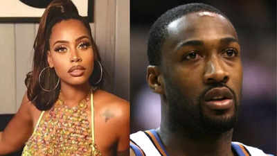 Gilbert Arenas is all smiles as girlfriend, Melli Monaco, presents him with $2,999 Christmas gift