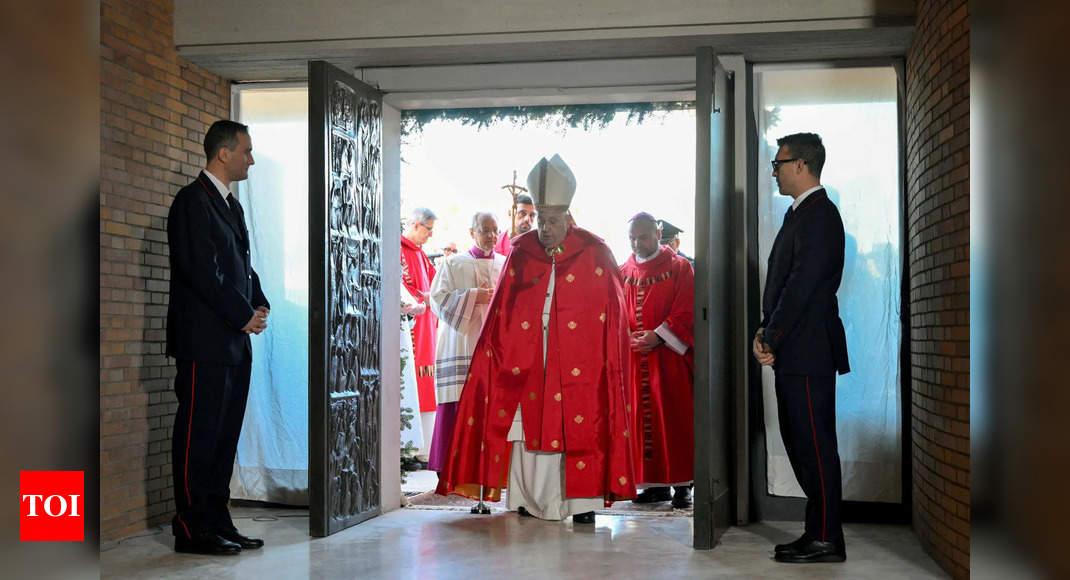 Pope Francis opens 'Holy Door' at one of Italy's largest prisons in historic first