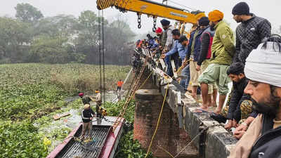 Eight passengers died after private bus plunges nearly 20 feet down in drain