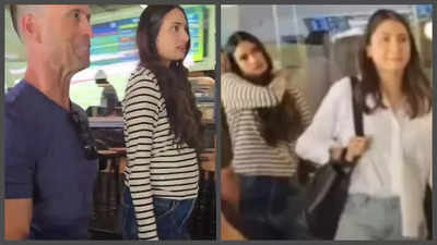 Mommy-to-be Athiya Shetty flaunts her baby bump in a checkered t-shirt as she hangs out with Anushka Sharma - See photos