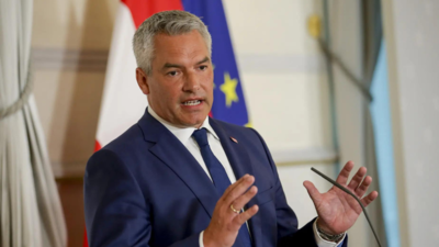 Austria's chancellor says will step down in 'coming days'