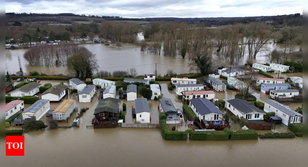 Severe flooding and winter weather disrupts life across UK, 60 rescued