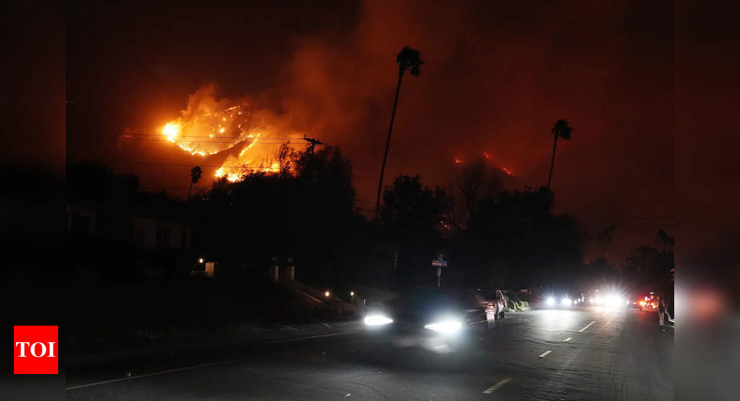 Los Angeles wildfire update: Flames ravage Hollywood Hills, thousands flee