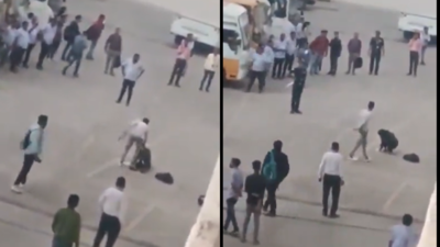 Colleague hacks woman with cleaver in office parking lot as people watch