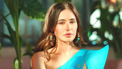 Nargis Fakhri says she found *b**b thrusting in Bollywood dance numbers difficult; reveals she left the industry due to an unfortunate situation