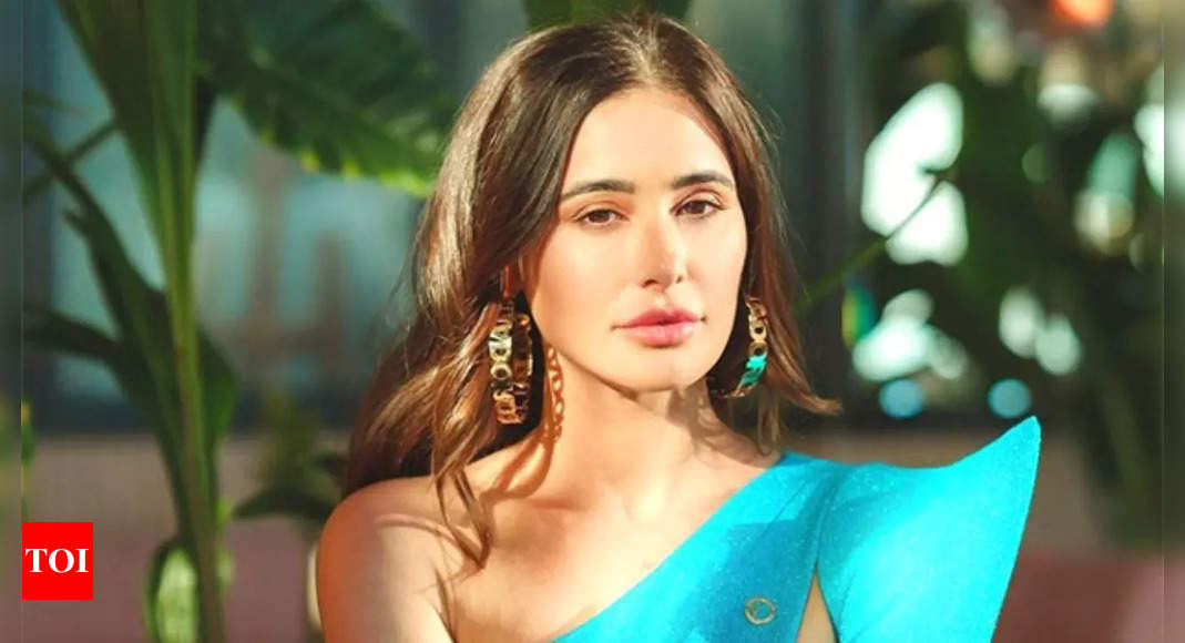 Nargis Fakhri says she found *b**b thrusting in Bollywood dance numbers difficult; reveals she left the industry due to an unfortunate situation