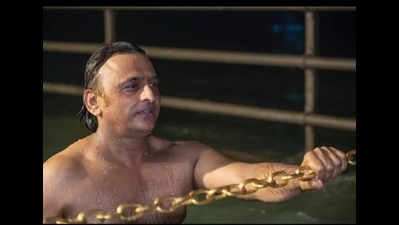 Samajwadi Party chief Akhilesh Yadav takes holy dip in Haridwar