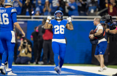 RB Jahmyr Gibbs celebrates a TD against the Commanders in NBA's favorite forward Kevin Durant style