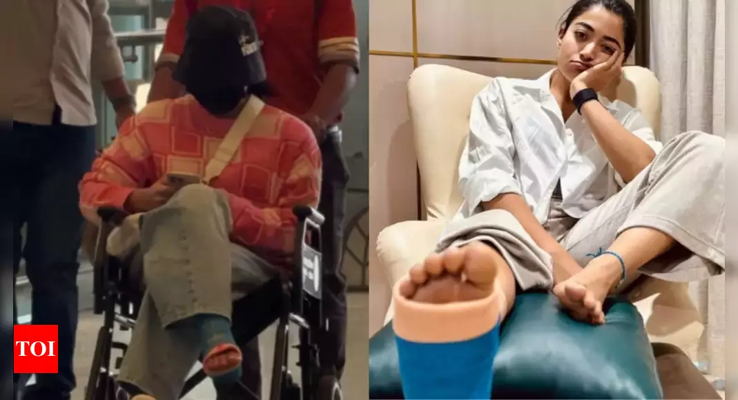 Rashmika Mandanna travels in a wheelchair after leg injury; spotted limping at Hyderabad airport