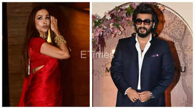 Malaika Arora stuns in a ravishing red saree as she reunites with ex-boyfriend Arjun Kapoor at friend's engagement - See photos