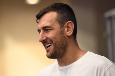 Andrew Bogut Slams Australian Open Crowd for Booing Novak Djokovic Amidst Injury Withdrawal and Personal Beliefs Controversy