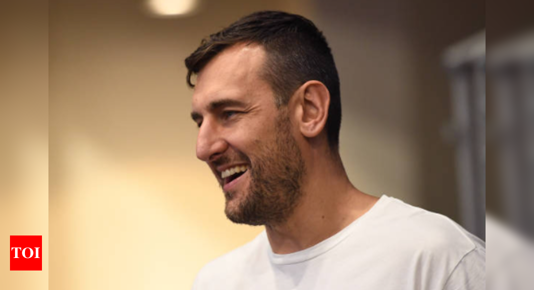 Andrew Bogut Slams Australian Open Crowd for Booing Novak Djokovic Amidst Injury Withdrawal and Personal Beliefs Controversy