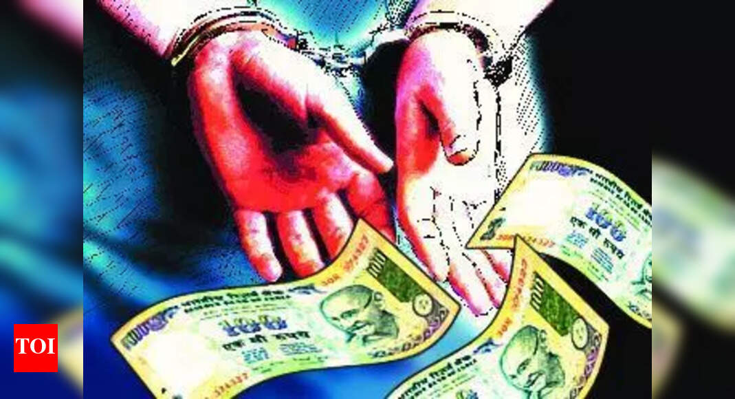 ACB arrests two education department officials for bribery - The Times of India
